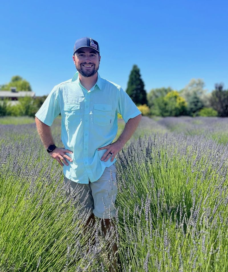Brock Reiner standing in a lavender field